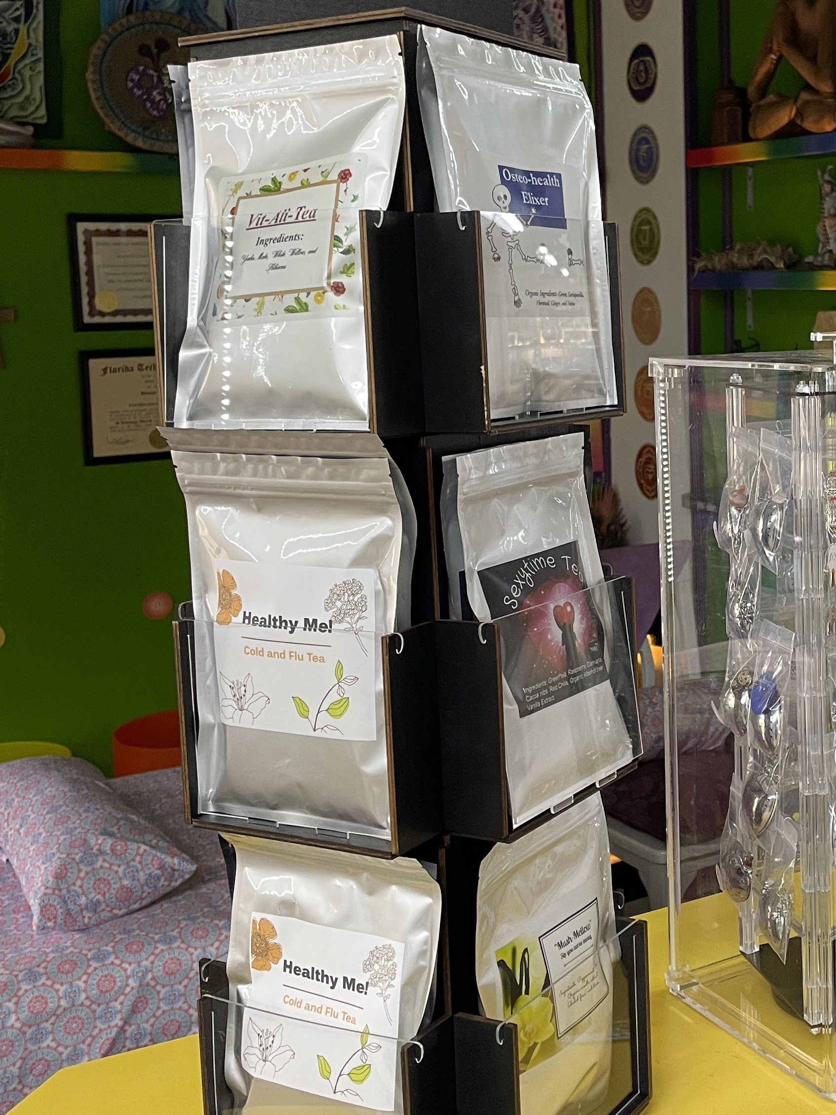 Sassy Fae herbal tea product display — Vit-All-Tea, Osteo-health Elixer, Healthy Me, and Sexytime Tea